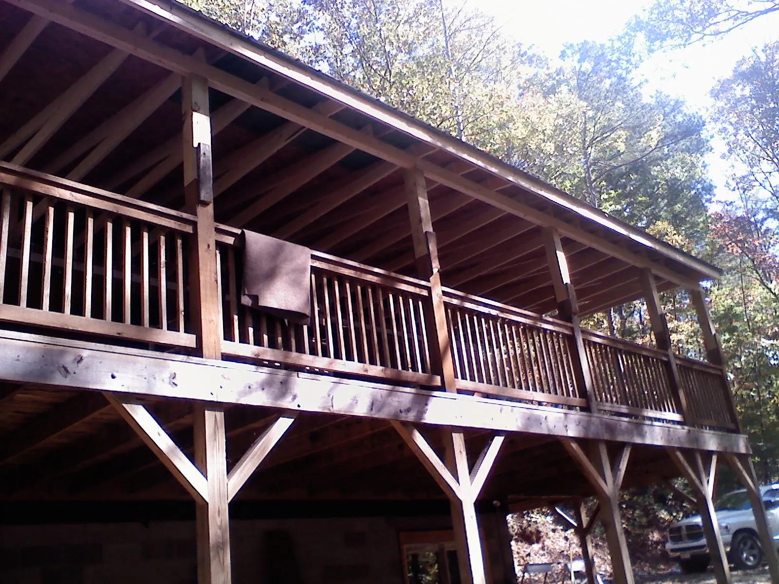 Timber framing under a new elevated porch and deck — Roof Leak Repair in Weidman by Roofing Brothers